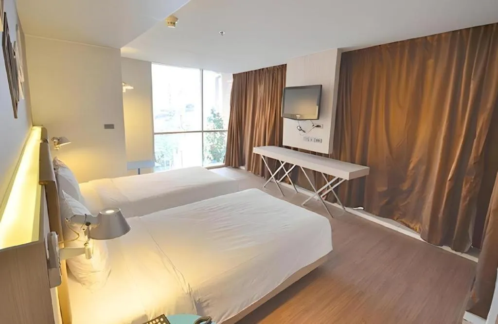 Bed in The Heritage Silom Hotel