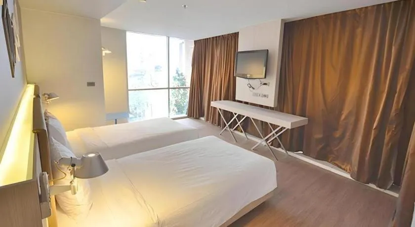 Bed in The Heritage Silom Hotel