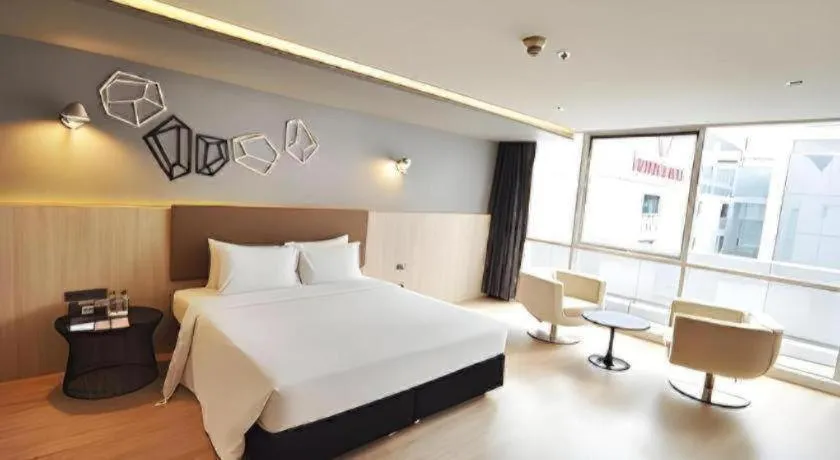 Bed in The Heritage Silom Hotel