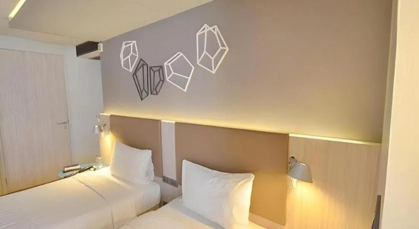 Bed in The Heritage Silom Hotel