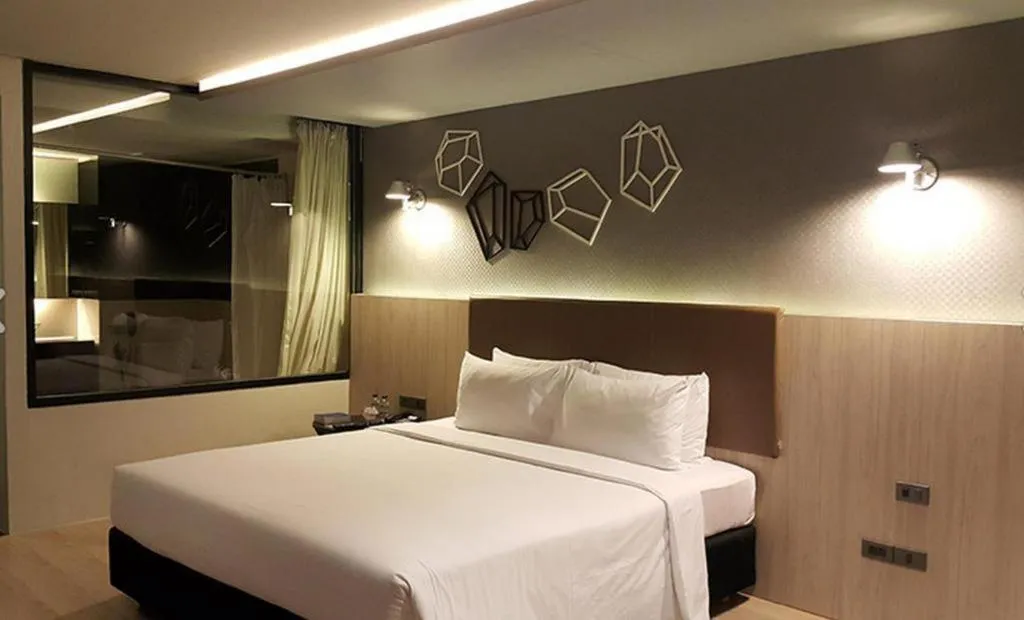 Bed in The Heritage Silom Hotel