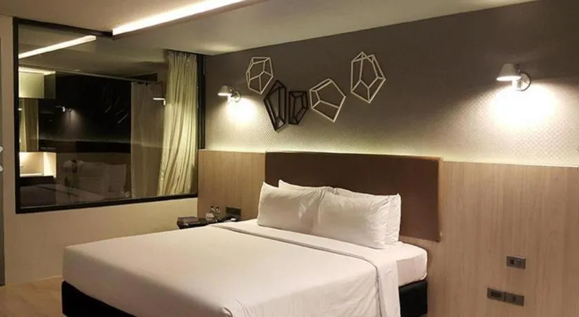 Bed in The Heritage Silom Hotel