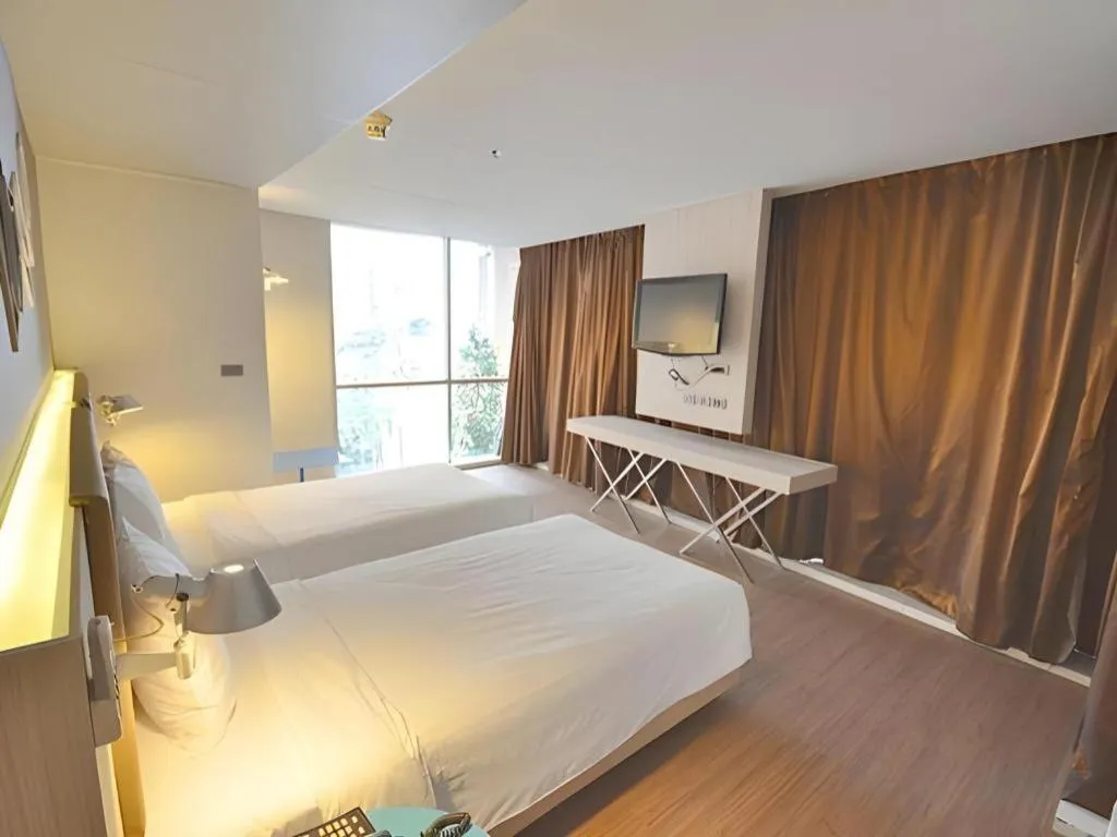 Bed in The Heritage Silom Hotel