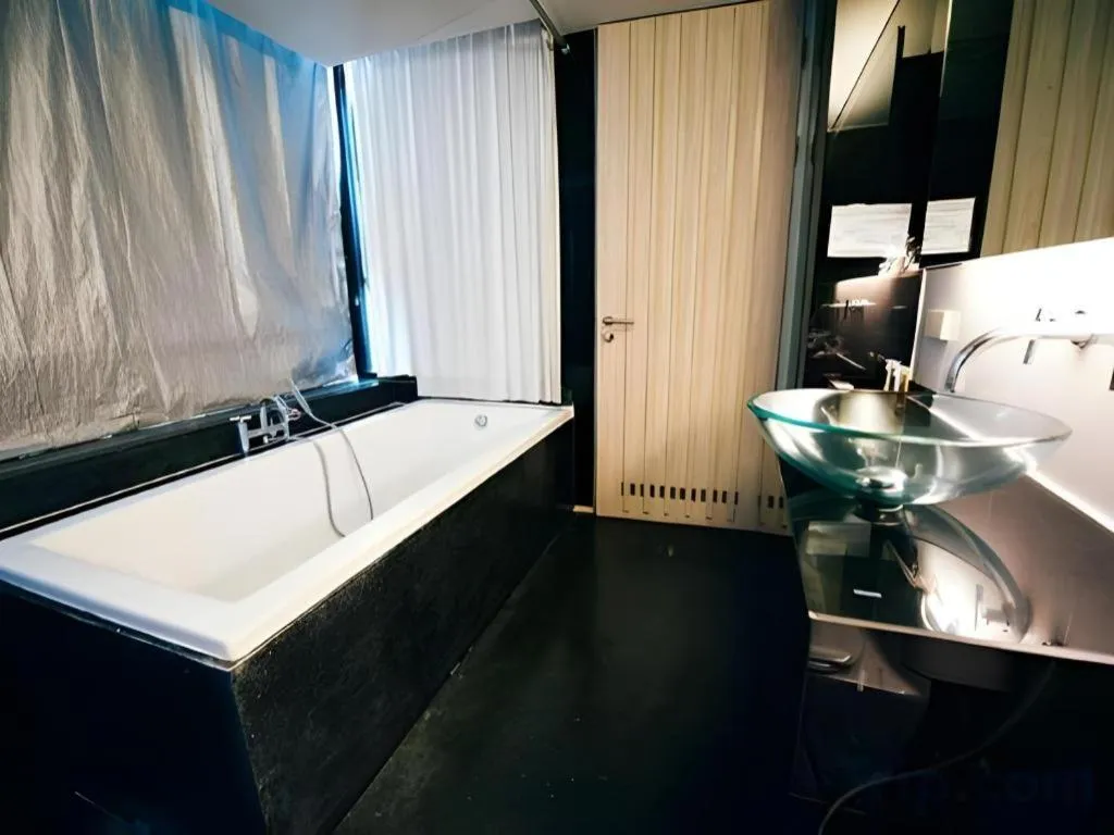 Bed in The Heritage Silom Hotel