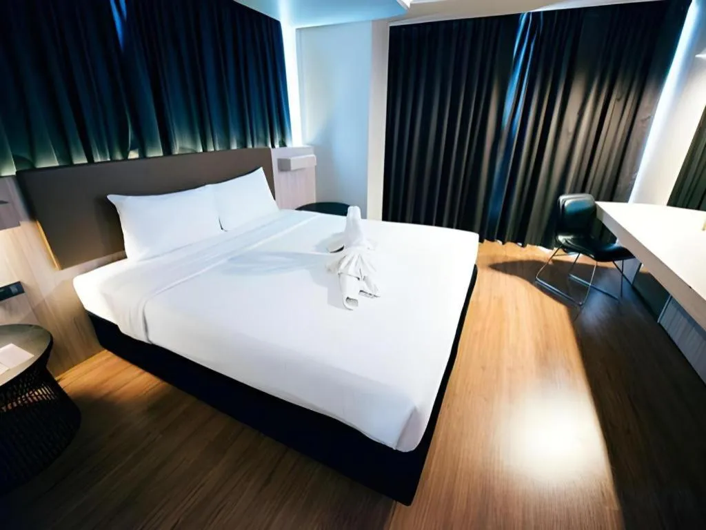 Bed in The Heritage Silom Hotel