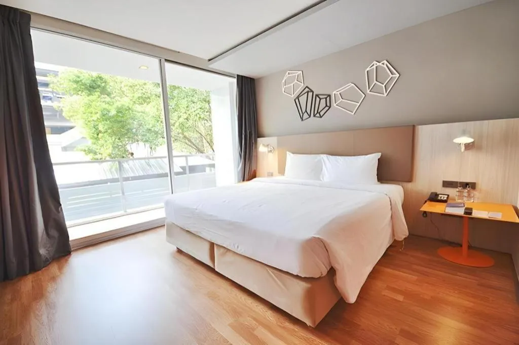 Bed in The Heritage Silom Hotel