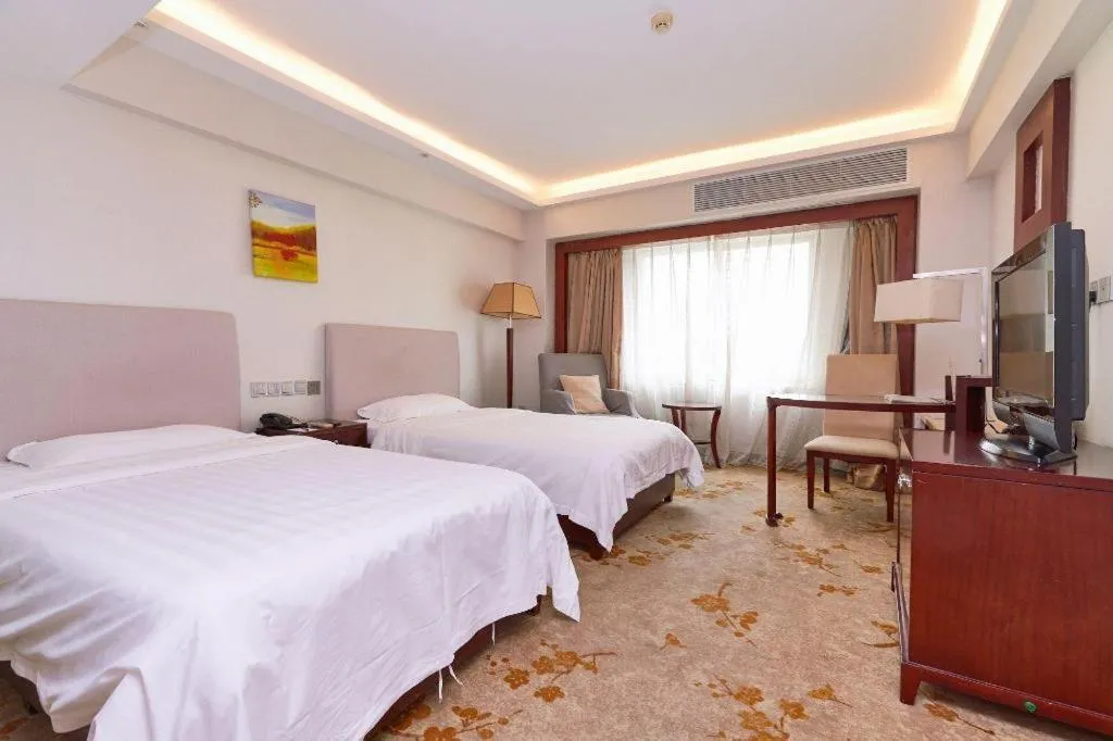 Bed in Starmoon Hotel