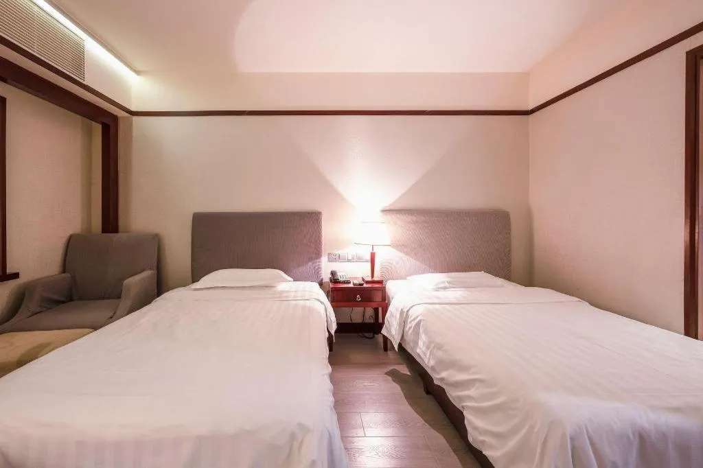 Bed in Starmoon Hotel