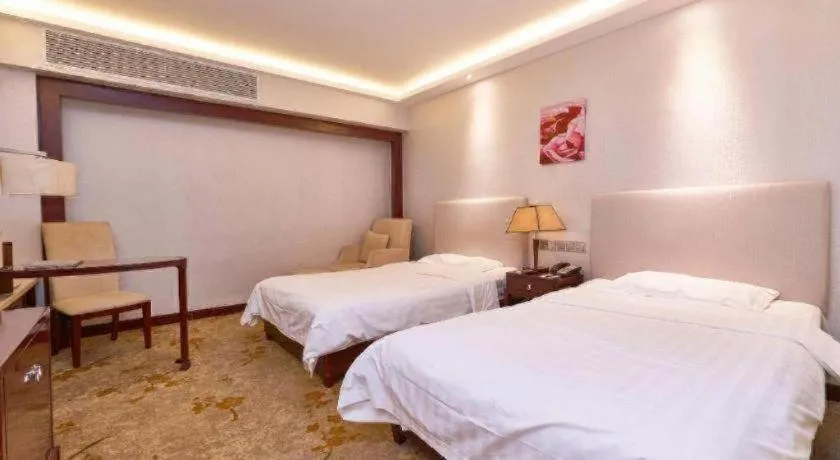 Bed in Starmoon Hotel