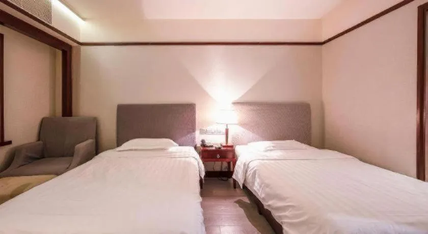 Bed in Starmoon Hotel