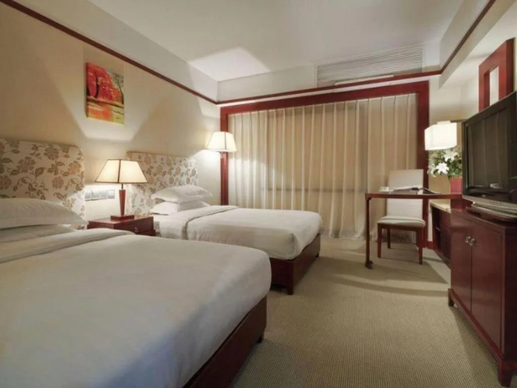 Bed in Starmoon Hotel