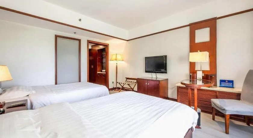 Bed in Starmoon Hotel