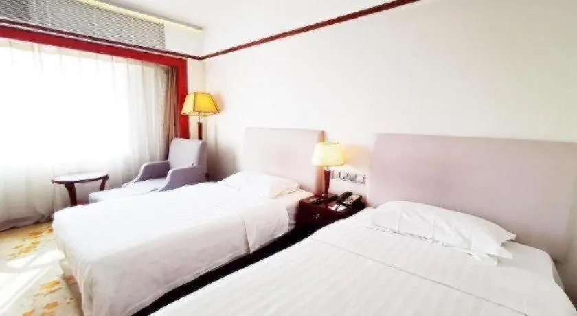 Bed in Starmoon Hotel