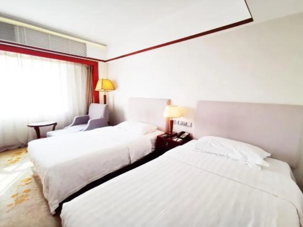 Bed in Starmoon Hotel