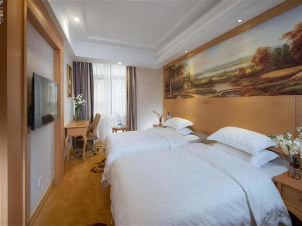 Bed in GreenTree Inn Shenzhen DonGMEn Business Hotel