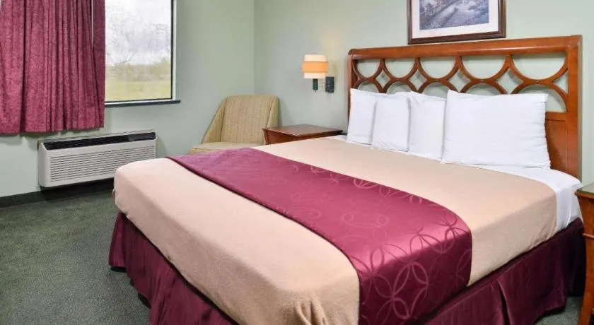 Bed in Americas Best Value Inn Gonzales