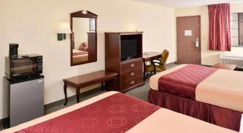 Bed in Americas Best Value Inn Gonzales