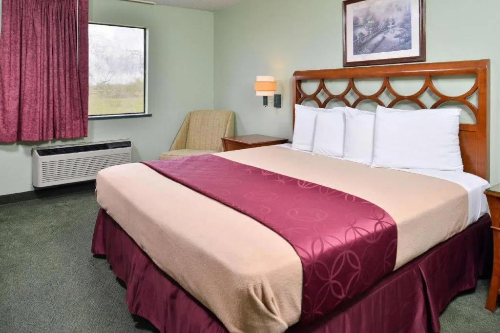 Bed in Americas Best Value Inn Gonzales
