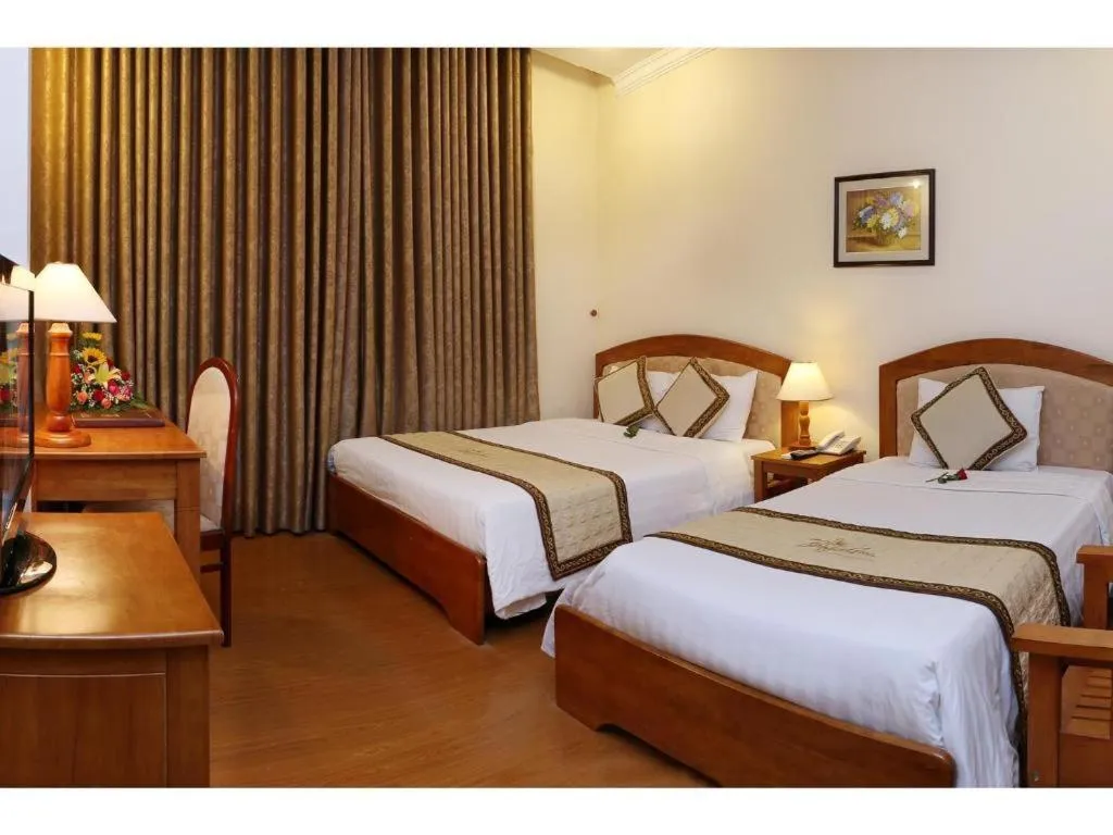 Bed in Bamboo Green Hotel