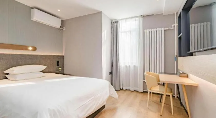 Bed in Jinjiang Inn Qingdao Development Zone Jinggangshan Rd.