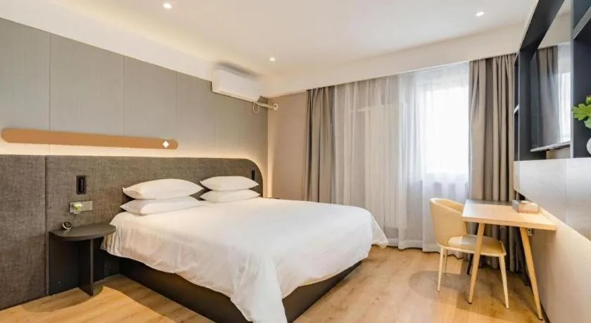 Bed in Jinjiang Inn Qingdao Development Zone Jinggangshan Rd.