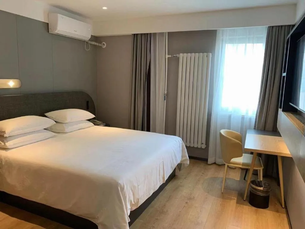 Bed in Jinjiang Inn Qingdao Development Zone Jinggangshan Rd.