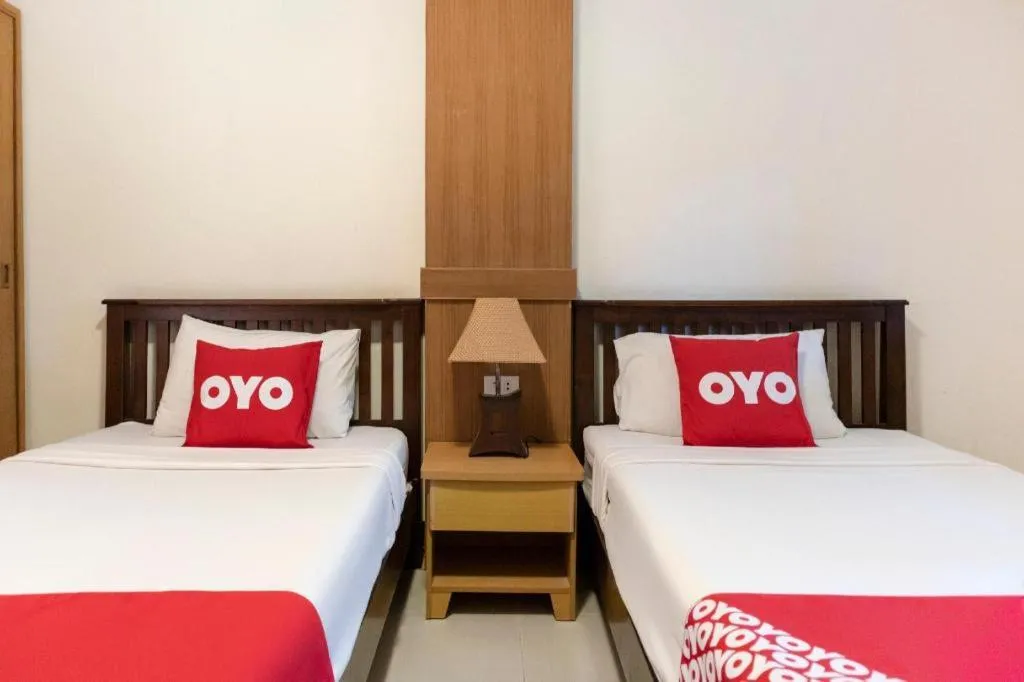 Bed in OYO 1046 Noppharat resort