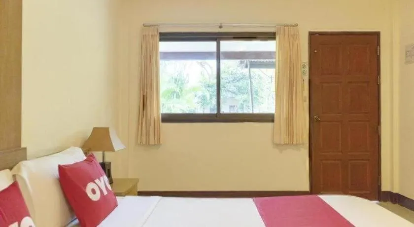 Bed in OYO 1046 Noppharat resort