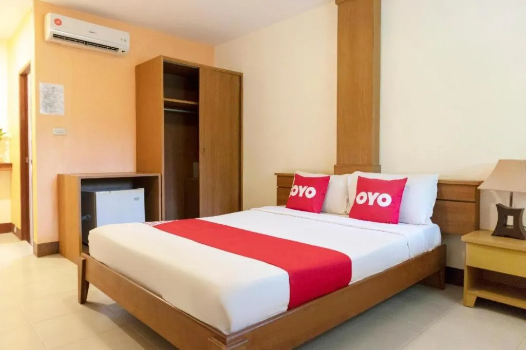 Bed in OYO 1046 Noppharat resort