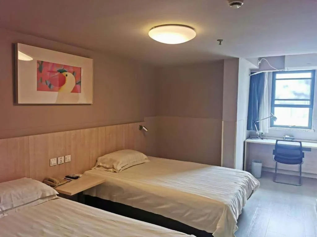 Bed in Jinjiang Inn Wuhu Fangte Tech Museum Metro Station