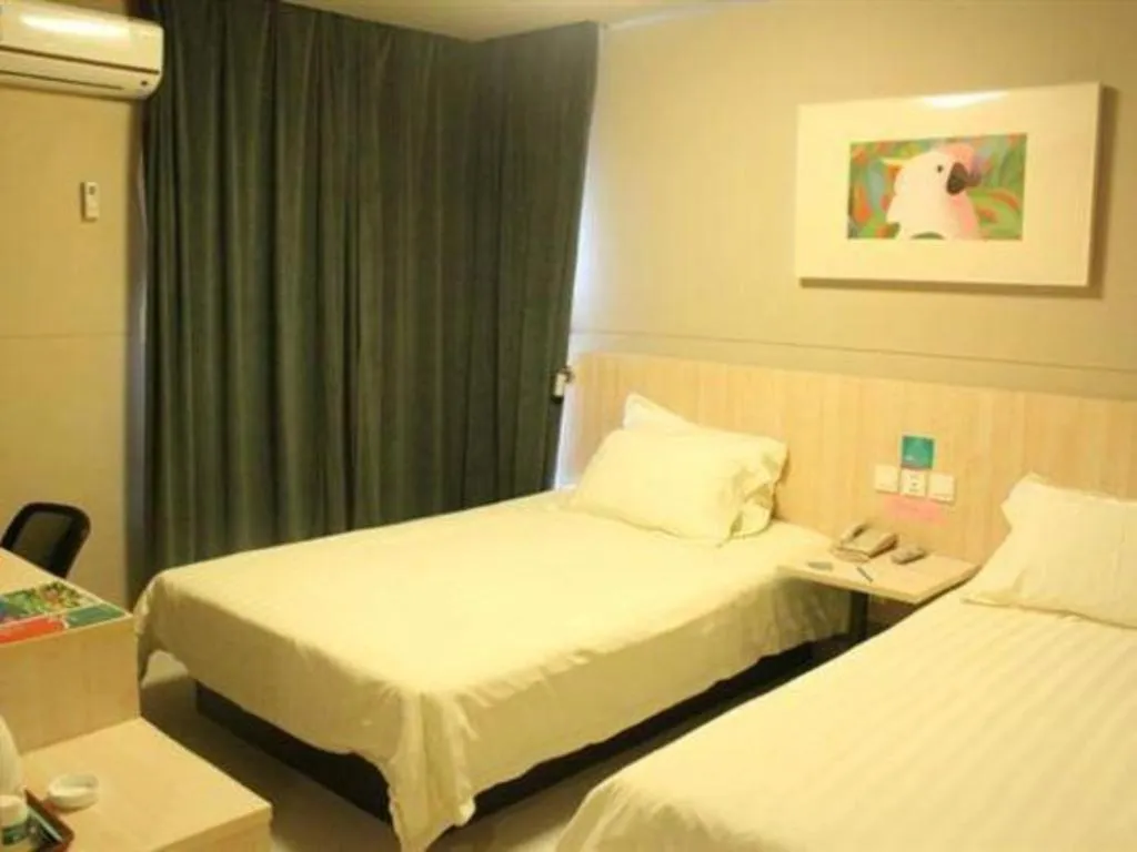 Bed in Jinjiang Inn Wuhu Fangte Tech Museum Metro Station