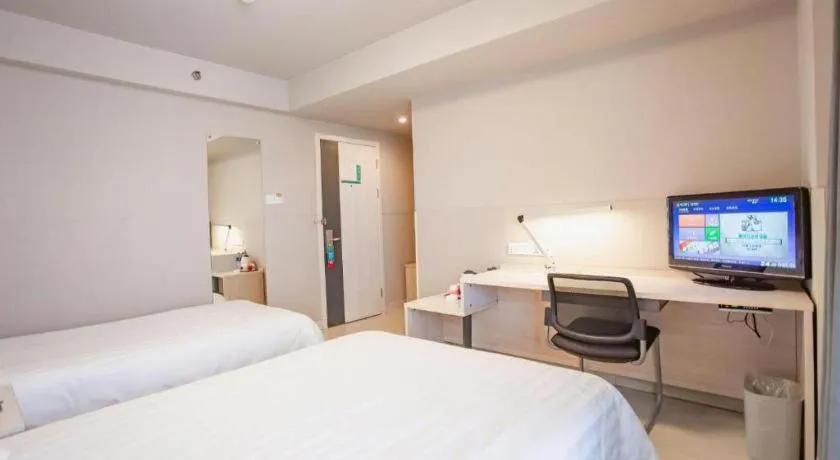 Bed in Jinjiang Inn Wuhu Fangte Tech Museum Metro Station