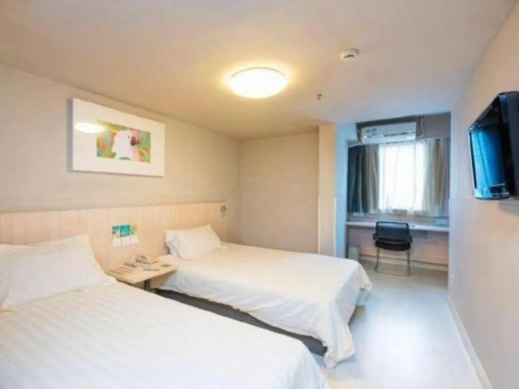 Bed in Jinjiang Inn Wuhu Fangte Tech Museum Metro Station