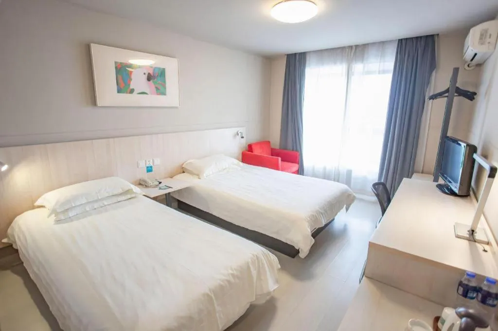 Bed in Jinjiang Inn Wuhu Fangte Tech Museum Metro Station