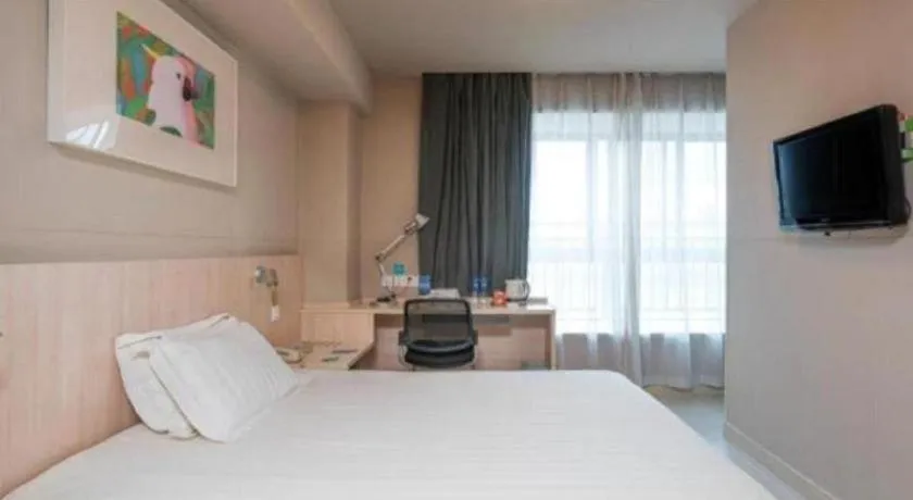 Bed in Jinjiang Inn Wuhu Fangte Tech Museum Metro Station