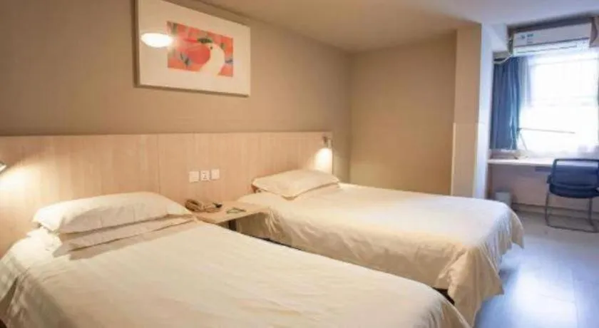 Bed in Jinjiang Inn Wuhu Fangte Tech Museum Metro Station