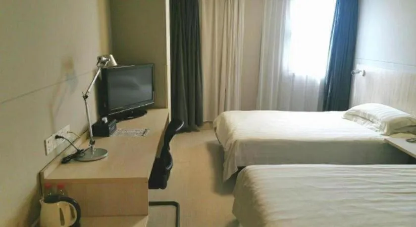 Bed in Jinjiang Inn Wuhu Fangte Tech Museum Metro Station