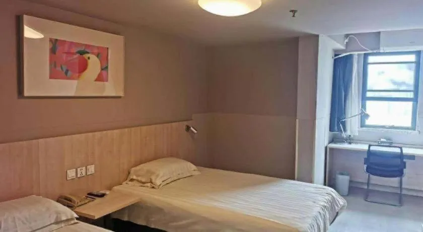 Bed in Jinjiang Inn Wuhu Fangte Tech Museum Metro Station