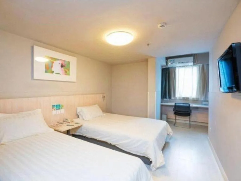 Bed in Jinjiang Inn Wuhu Fangte Tech Museum Metro Station