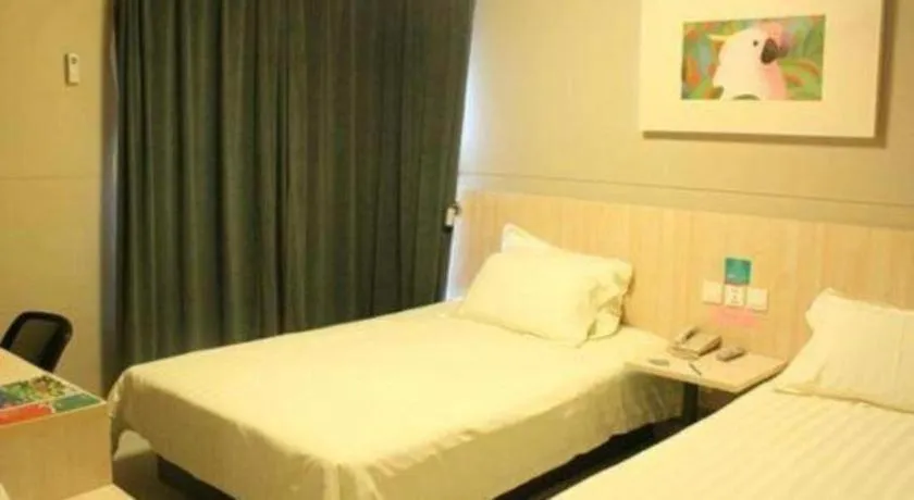 Bed in Jinjiang Inn Wuhu Fangte Tech Museum Metro Station