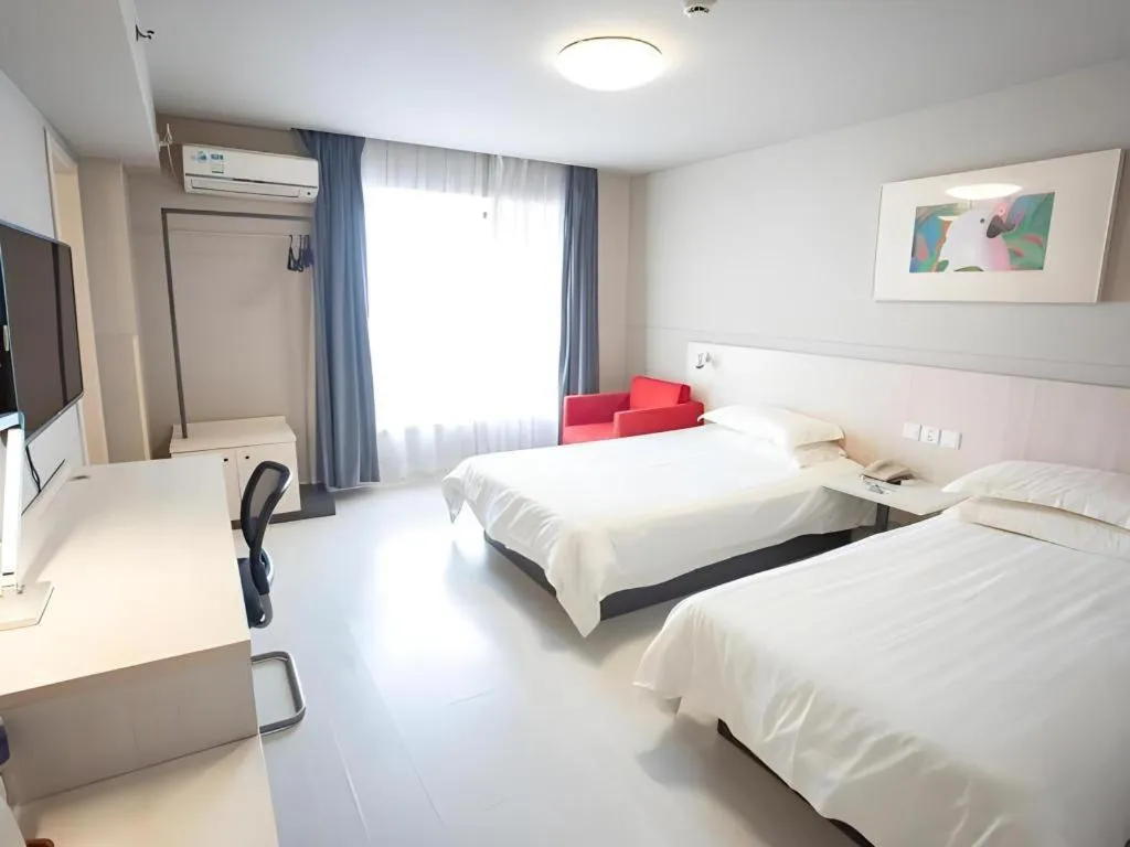 Bed in Jinjiang Inn Wuhu Fangte Tech Museum Metro Station