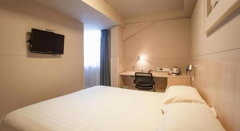 Bed in Jinjiang Inn Wuhu Fangte Tech Museum Metro Station