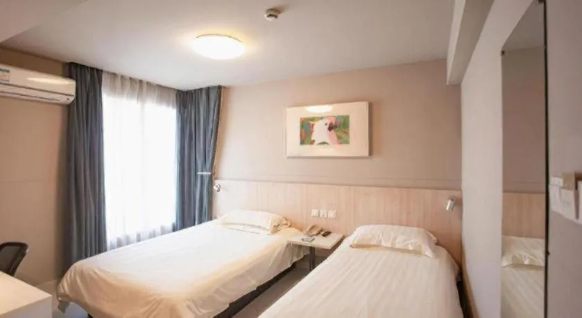 Bed in Jinjiang Inn Wuhu Fangte Tech Museum Metro Station