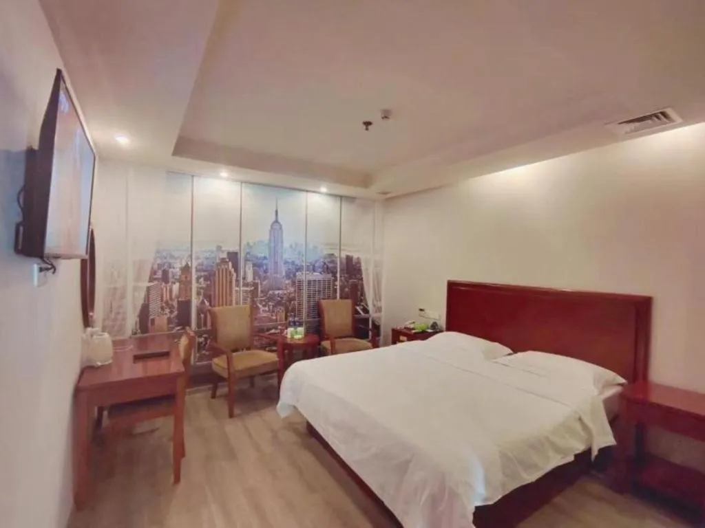 Bed in GreenTree Inn Suzhou Shengze Hotel