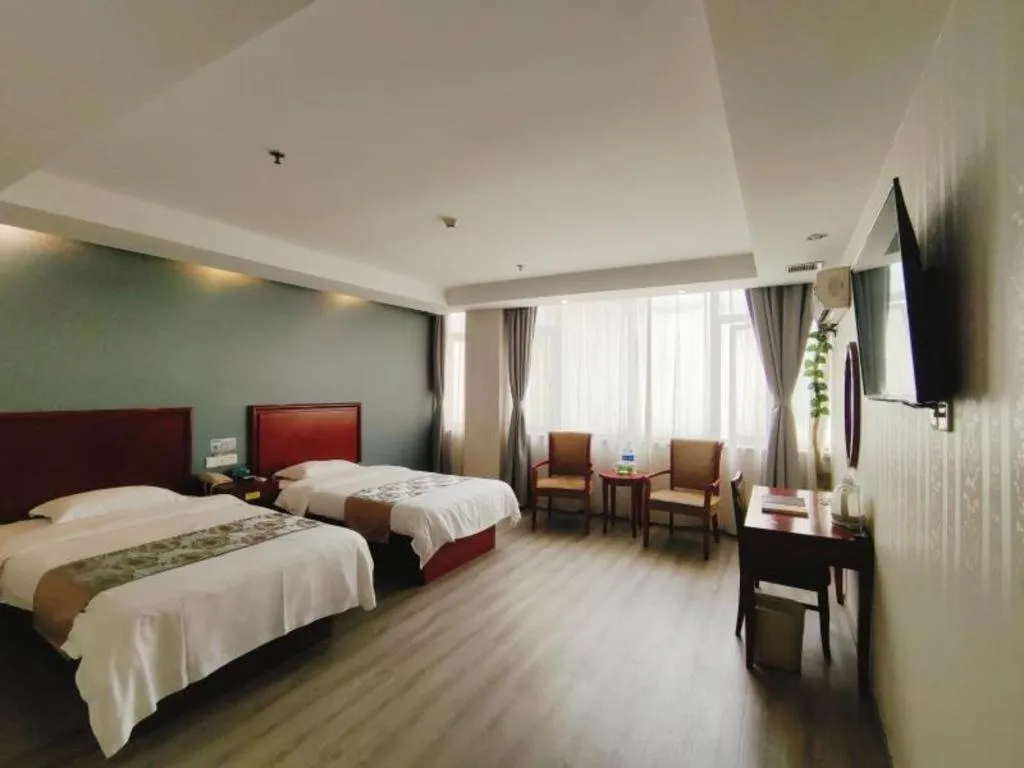 Bed in GreenTree Inn Suzhou Shengze Hotel