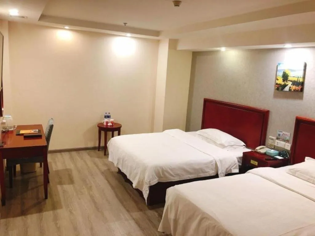 Bed in GreenTree Inn Suzhou Shengze Hotel