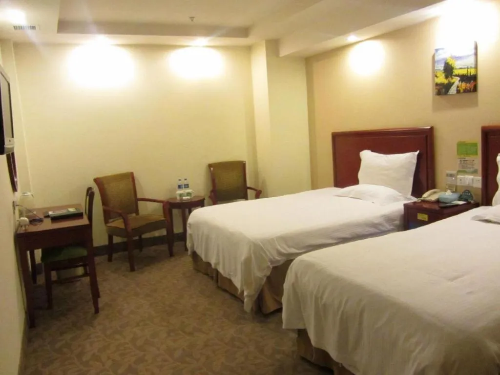 Bed in GreenTree Inn Suzhou Shengze Hotel