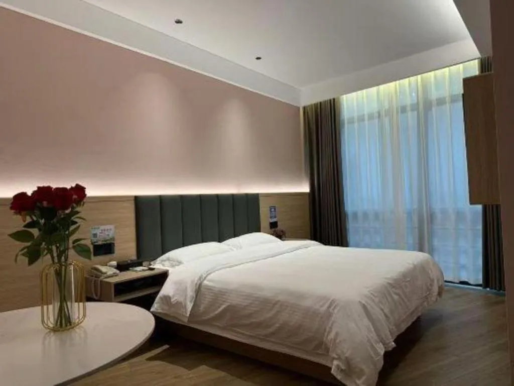 Bed in GreenTree Inn Suzhou Shengze Hotel