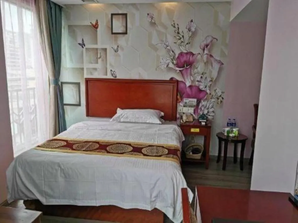 Bed in GreenTree Inn Suzhou Shengze Hotel