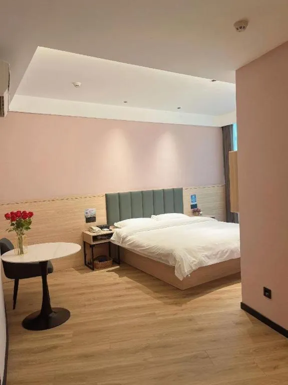 Bed in GreenTree Inn Suzhou Shengze Hotel